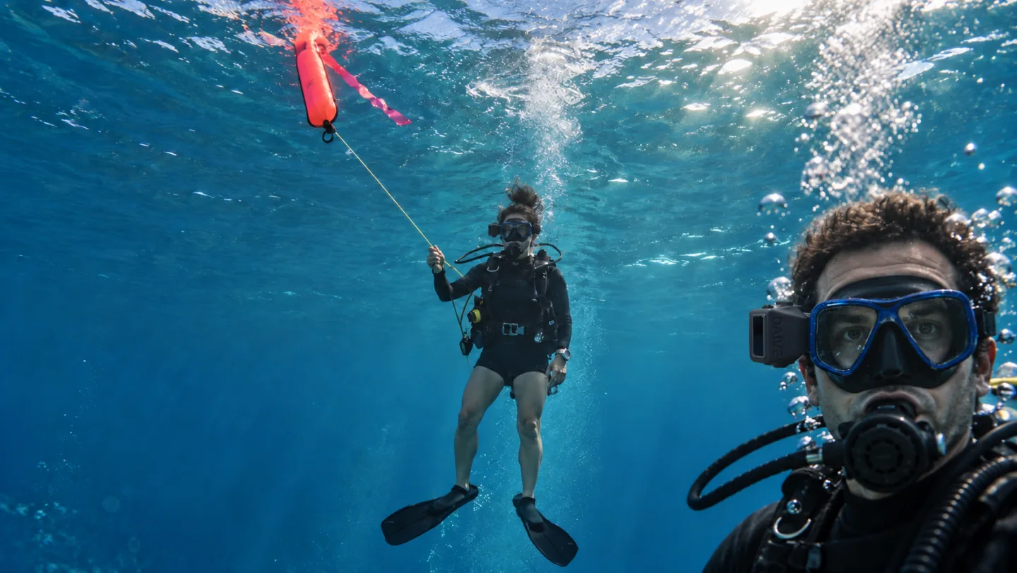 Illustrative concept scene of a diver managing an SMB deployment
